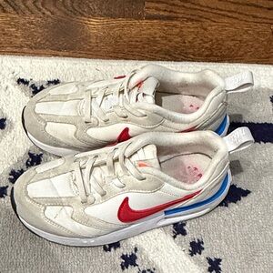 Nike Kids White Sneakers with Red and Blue Accents